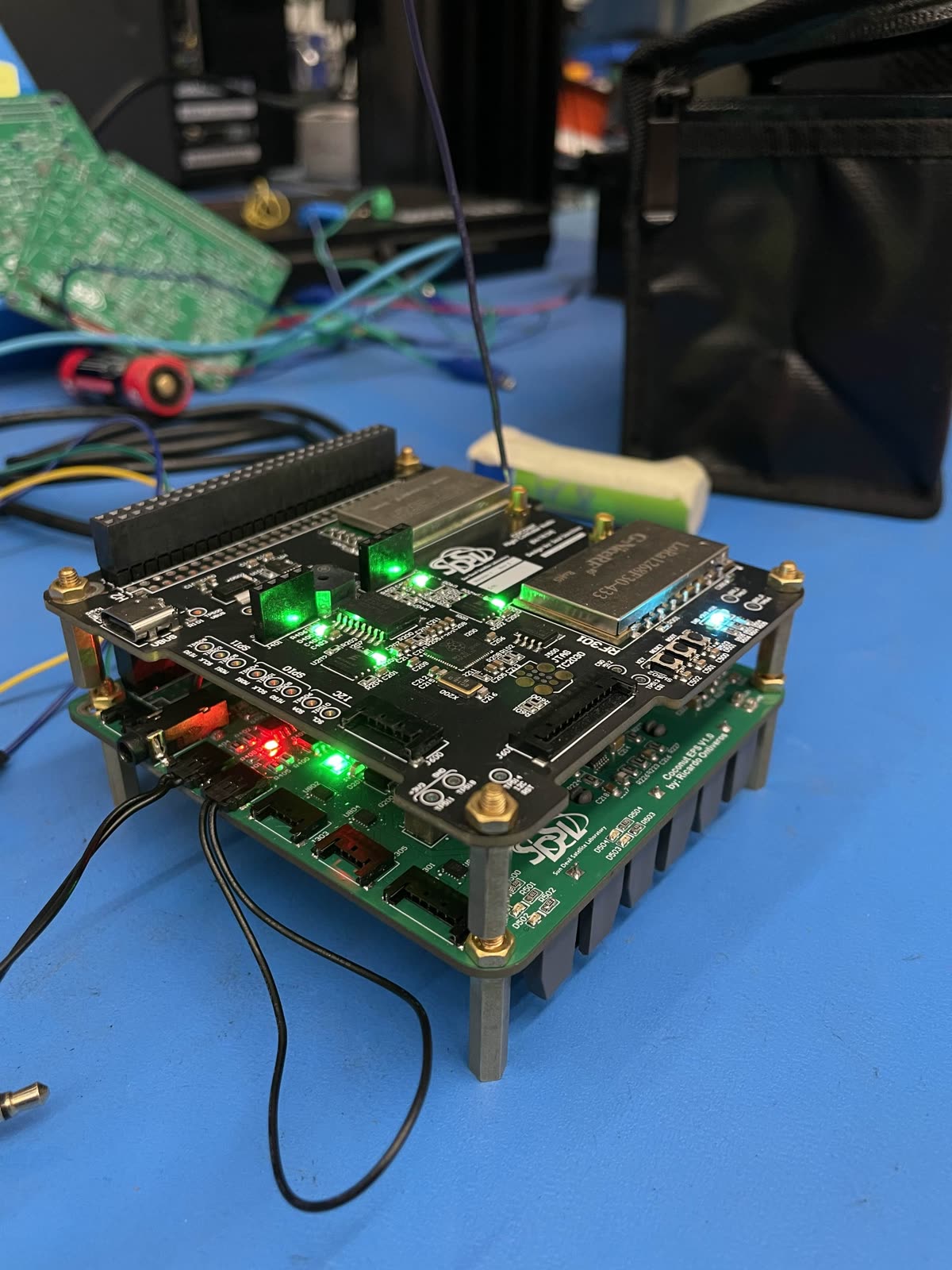 1U CubeSat avionics stack powered on during bench testing